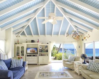 Villa Oyster Pearl - Luxury Beach Front Villa - Concierge - Hot Tub - Sleeps 19 - Oyster Pond - Huiskamer