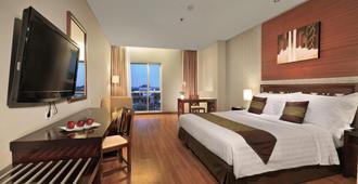 Aston Tanjung City Hotel - Tanjung - Bedroom