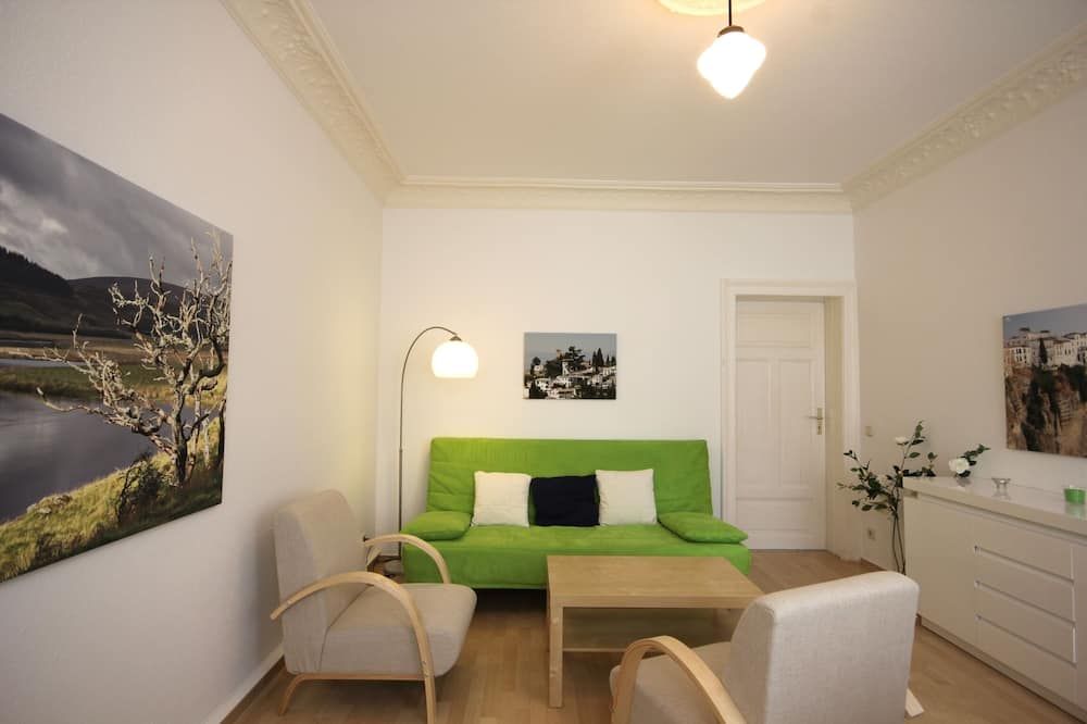 Modern and friendly 3-bedroom apartment with beautiful garden - לייפציג - סלון