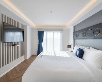 Kokotel Chiang Rai Airport Suites - Chiang Rai