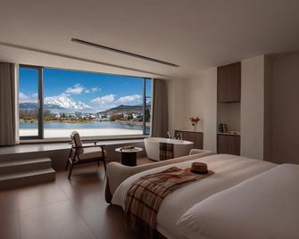 Xianyunxi yuexueshan Garden Resort courtyard - Lijiang - Chambre