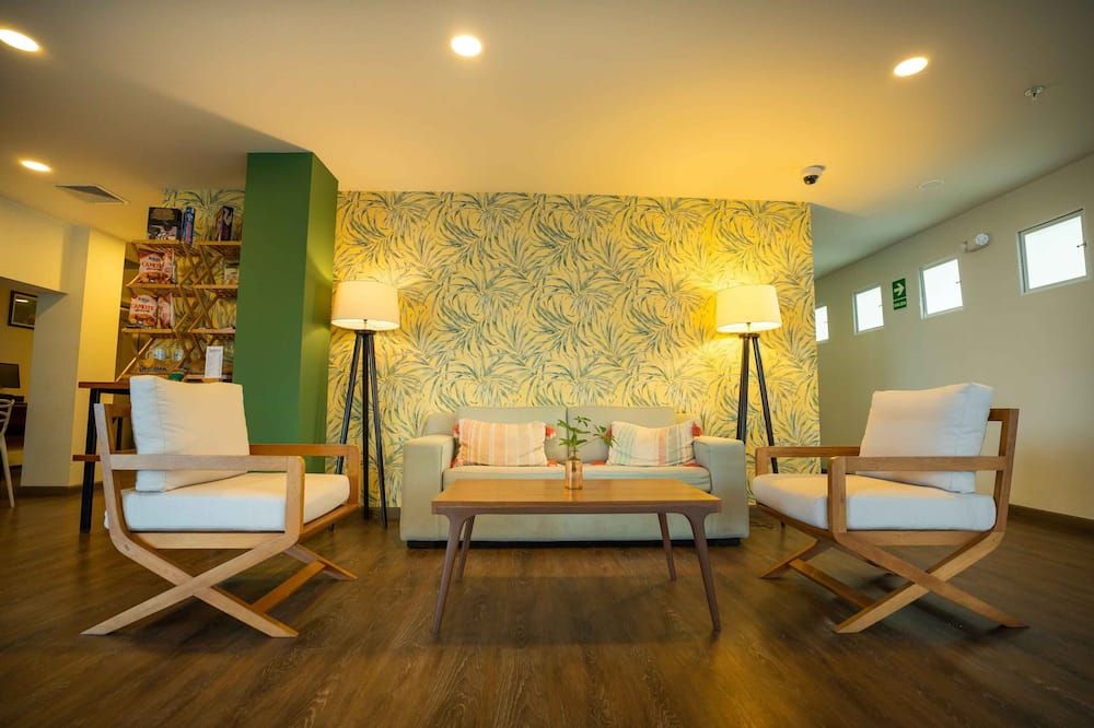 كازا أندينا سيليكت باراكاس - باراكاس - غرفة معيشة