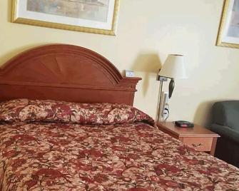 Select Inn - Manitouwadge - Bedroom