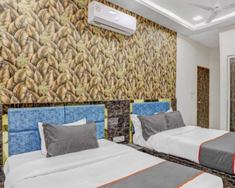 Hotel Sarovar inn - Ahmedabad - Slaapkamer