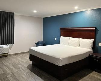 Super 8 by Wyndham Mesa Downtown Near Convention Center - Меса - Спальня
