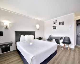 موتل نيو ستار لافال - لافال - غرفة نوم