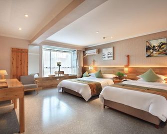 Guilin Sky Palace Hotel - גילין - חדר שינה