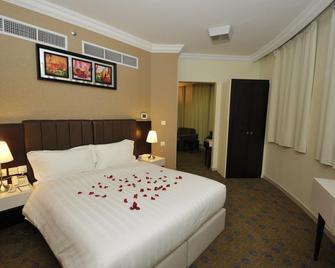 Azka Al Safa Hotel - Mecca - Bedroom