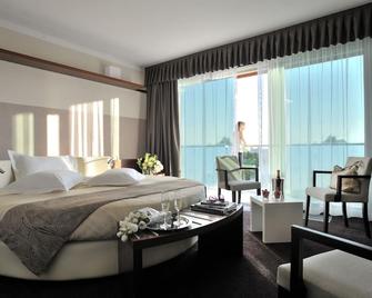 Aqualux Hotel Spa & Suite - ברדולינו - חדר שינה