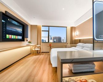 Guipuxuan Yu Hotel (Nanyang Intermediate People’s Court Branch) - Nanyang - Bedroom