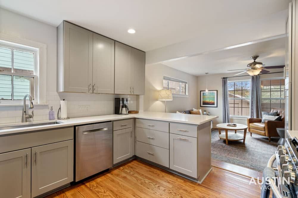 Elegant Escape Gourmet Kitchen and Outdoor Living - Austin - Kitchen