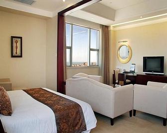Kunlun International Hotel - ยานไถ - ห้องนอน