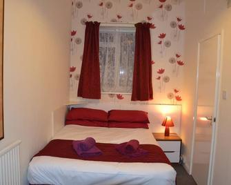 Abbey Lodge Hotel - London - Schlafzimmer