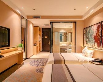 Zhentu Lanshe Hotel - Daqing - Bedroom