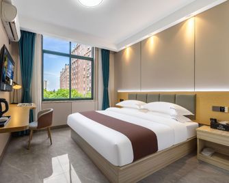 Meichen Cloud Hotel (Yangzhou University Town Wanda Plaza Branch) - Yangzhou - Bedroom