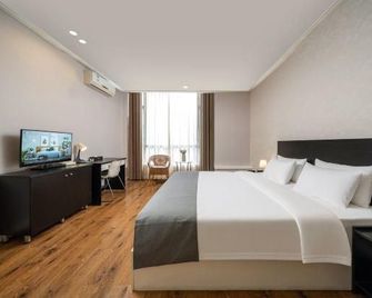 Spring Hotel - Kanton - Slaapkamer