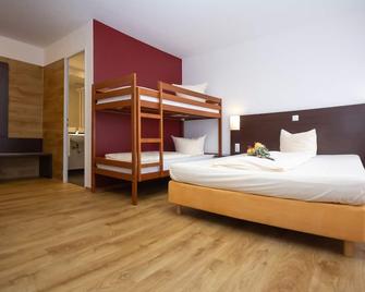 iQ-Hotel - Langenau - Camera da letto