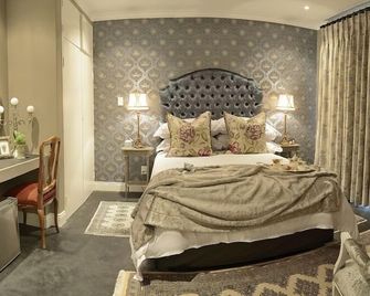 Duke & Duchess Boutique Hotel - פרטוריה - חדר שינה