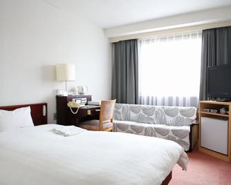 Hotel Sunshine Iwaki - Iwaki - Schlafzimmer