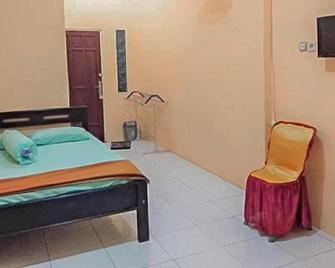 Griya Tambun Raya Redpartner - Palangkaraya - Bedroom