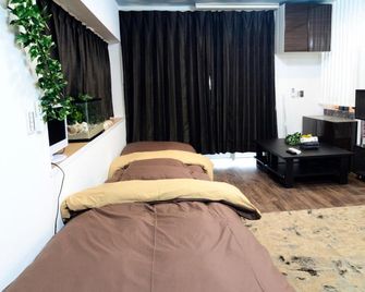 South Island - Itoman - Спальня