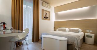 Hotel Daniele - ליניאנו סביאדורו - חדר שינה