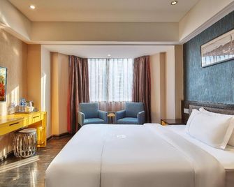 Insail Hotels -Huanshi Road Taojin Metro Station Guangzhou- Free shuttle bus for Canton Fair - גואנגג'ואו - חדר שינה