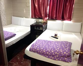 Merryland Guest House - Hong Kong - Habitación