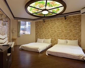 @ Tainan Inn - Tainan City - Bedroom