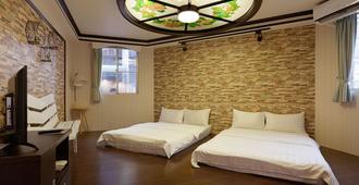 @ Tainan Inn - Tainan City - Bedroom