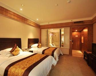 Eyring Daqian International Hotel - Neijiang - Bedroom
