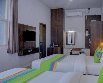 Treebo Trend Lucent The Homely Stay - Chikamagalur - Bedroom