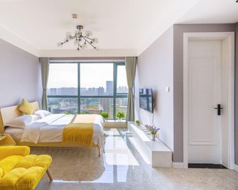 Muguang Preferred Apartment (Taiyuan Qinxiannorth Street Maoye Tiandi Store) - Taiyuan - Sala de estar