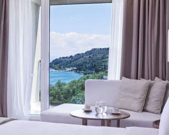 Mythos Palace Resort - Adults Only - Messonghi - Wohnzimmer