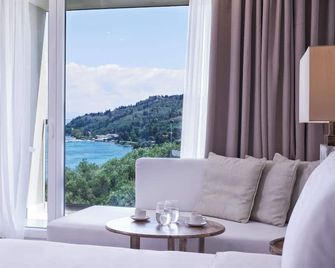 Mythos Palace Resort - Adults Only - Messonghi - Wohnzimmer