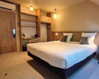 Brit Hotel Confort Alencon - Алансон - Спальня