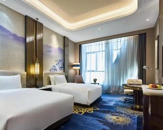 Wanda Vista Hotel Urumqi - Ürümqi - Bedroom