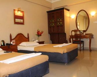 Hotel Pooja International - Davangere - Habitación