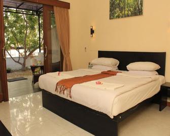 Bumbangku Beach Cottage - Bumbang - Habitación