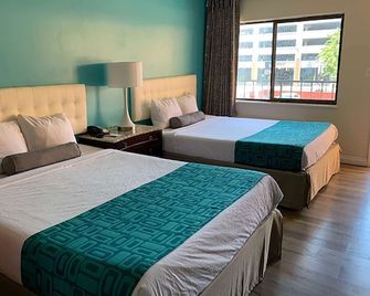 Howard Johnson by Wyndham Reno Downtown - Reno - Bedroom