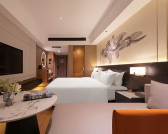 Ginza Lizhi Hotel (Yimeng North Road Olympic Sports Center Branch, Beicheng New District, Linyi) - Linyi - Bedroom