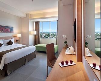 أستن سولو هوتل - سوراكارتا - غرفة نوم