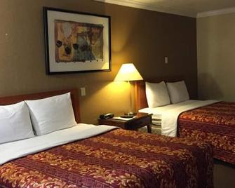 Executive Inn & Suites Beeville - Beeville - Schlafzimmer