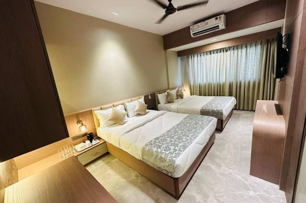 The Falcon Inn - מומבאי - חדר שינה