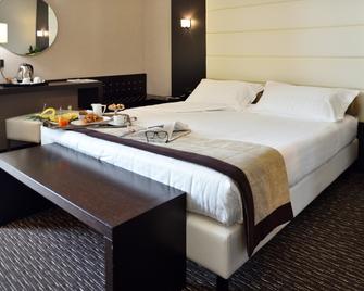 H2C Hotel Milanofiori - Assago - Camera da letto