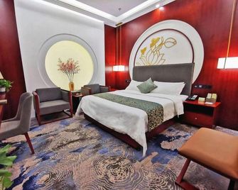 Yizhengyuan Hotel - Linyi - Bedroom