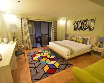 Almont City Hotel - Butuan - Bedroom