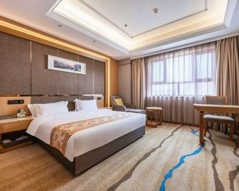 Wenzhou Hotel - Hotan - Camera da letto