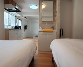 Hotel Rhodes - Tokyo - Bedroom