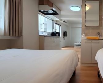 Hotel Rhodes - Tokyo - Bedroom